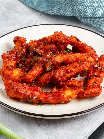 Another look at our irresistible Honey Chilli Crispy Chicken, with its glossy sauce and crispy texture.