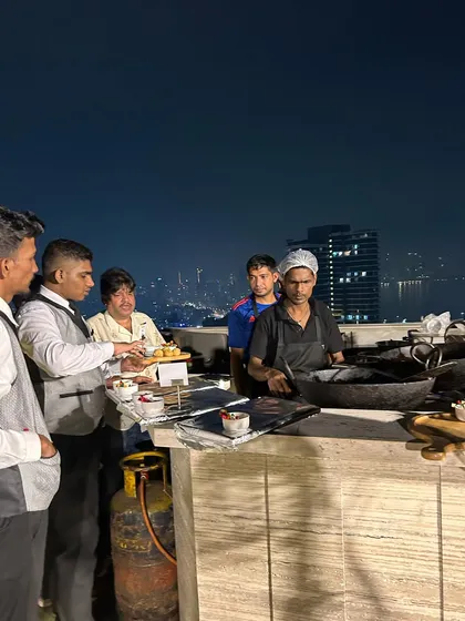 A live cooking station set up on a terrace for a Diwali party. I can set up my live counters almost anywhere, bringing a dynamic culinary experience to your unique event locations.