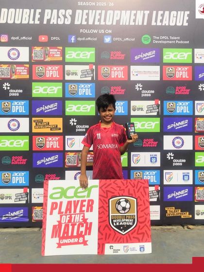 Madhav Verma of the U-8 team with his Man of the Match award after scoring twice to secure a victory in the DPDL.