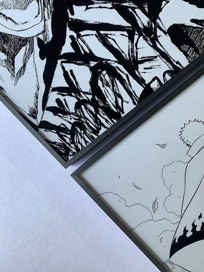 Bring your favorite anime and manga moments to life with custom framing. For this client, we framed a series of iconic black and white panels in our sleek gray metal frames for a sharp, modern display.