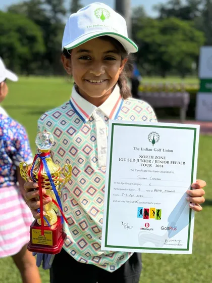 Suhani Chandra proudly displays her 2nd runner-up trophy and certificate from the IGU Tournament, North Zone.