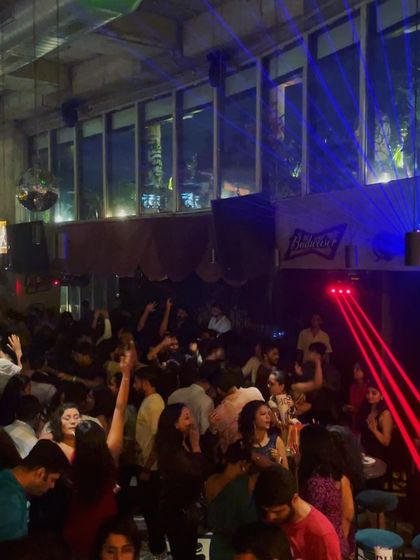 Red lasers slice through the crowd as the party hits its peak. The lighting and production are always a key part of my sets.