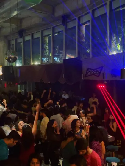Red lasers slice through the crowd as the party hits its peak. The lighting and production are always a key part of my sets.