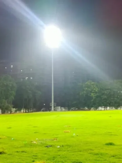 A wide view of our beautifully maintained outfield at the Chinchwad academy, illuminated by the powerful new floodlights.