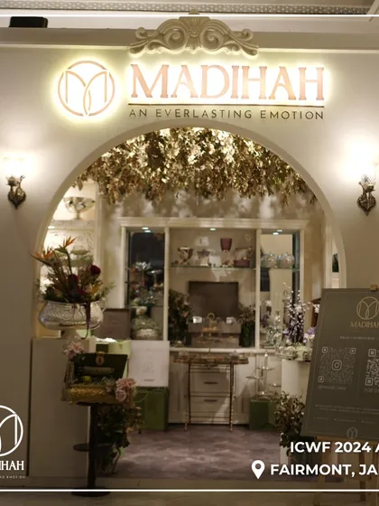 Our beautiful booth at the International Convention of Wedding Fraternity (ICWF) 2024 in Jaipur. The arched entrance and warm lighting were designed to welcome guests into the world of Madihah.