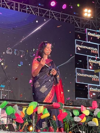 Sharing a smile on stage with Rajesh Krishnan in Davangere. Collaborating with other artists always brings a fresh energy and joy to the performance.