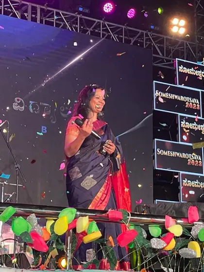 Sharing a smile on stage with Rajesh Krishnan in Davangere. Collaborating with other artists always brings a fresh energy and joy to the performance.