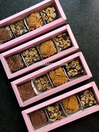 Gifting is a big part of what I do, and these assorted brownie bite boxes are a client favorite. Packaged beautifully in these pink boxes, they are perfect for Rakhi, party favors, or just to make someone's day.