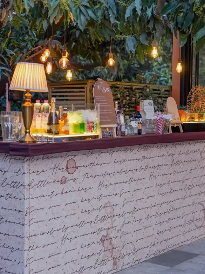 This custom bar front features handwritten script, adding a personal and artistic touch to the vintage theme. We believe even functional elements should be part of the design story.