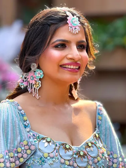 A beautiful, smiling portrait of the bride.