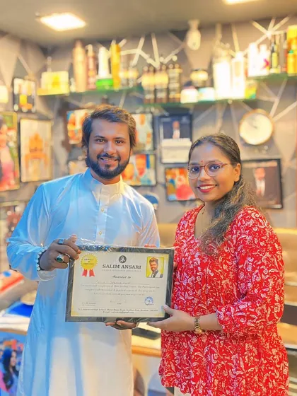 A proud moment awarding a certificate to a successful student. My goal is to see every person who joins my academy leave with the skills and confidence to build their own career.