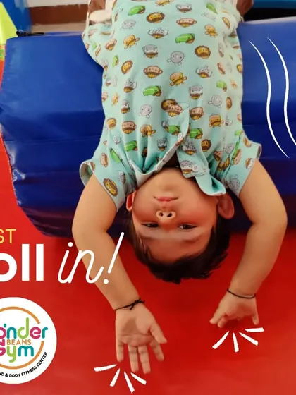 Learning to roll safely is a fundamental gymnastic skill. Using soft equipment like this octagon helps children understand the motion of a back roll, building their body awareness and confidence to try new things.