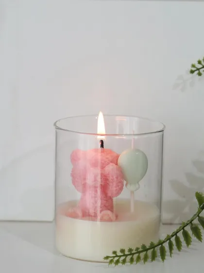 Announcing a new arrival is a joyous occasion. We created this adorable teddy bear candle as a unique birth announcement favor, a sweet and memorable way to share your happy news.