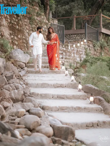 A quiet walk down the stone steps by the Ganga, a moment of connection for Shefali and Krisheth featured in Condé Nast Traveller.