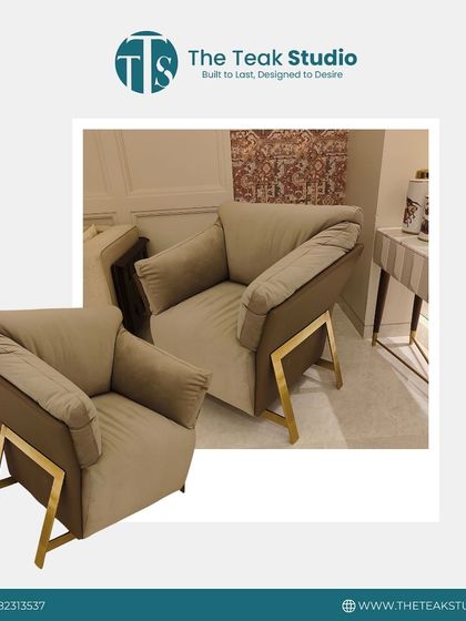 A modern and plush armchair design. This piece features oversized, comfortable cushions and a unique metal frame that adds an industrial-chic touch to the design.