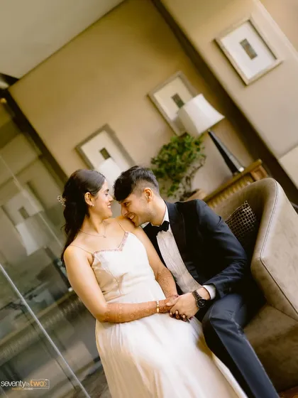 A creatively angled shot that adds a dynamic feel to this intimate moment. The dutch angle gives this sweet, romantic portrait an artistic, cinematic twist.