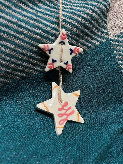 Another variation of the star ornament set, each with a unique abstract pattern.