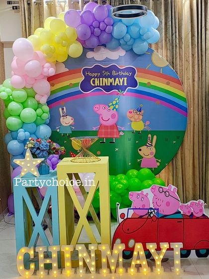 A closer look at the home-based Peppa Pig setup, showing the character cutouts and light-up letters.
