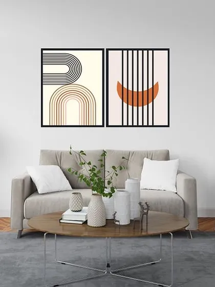 A set of two framed prints showcasing semi-circular and linear abstract designs. The clean lines and simple forms are perfect for adding a touch of modern, minimalist art to your home.