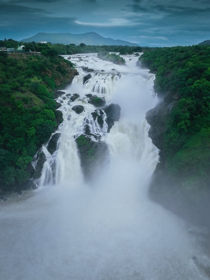 A powerful cascade at Shivanasamudra, with mist rising from the gorge below. It's a photographer's delight and a must-visit on our day trips from Bangalore.