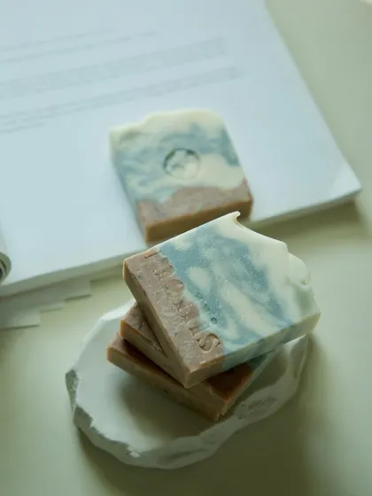 A stack of the Lavender, Rosemary & Peppermint bars, showcasing their beautiful, earthy layers.
