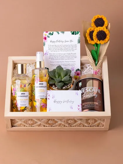 A birthday hamper is more than a gift; it's a personal message. This 'Tropical Dream' hamper was curated with a handwritten letter, fragrant body care, a favorite coffee, a live succulent, and handmade crochet sunflowers to make someone's day truly special.
