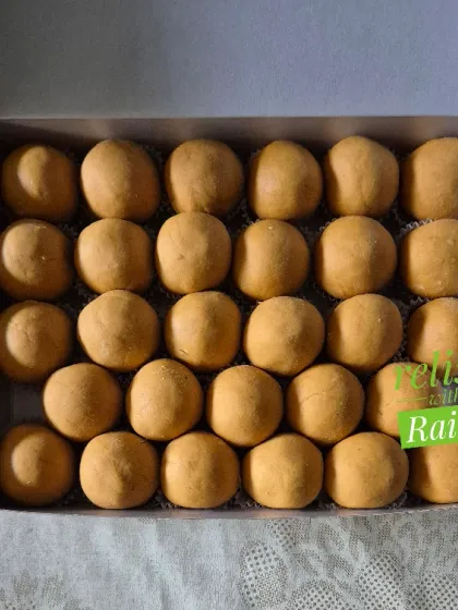 My Besan Laddoos are a timeless classic and a bestseller. I roast the besan (gram flour) carefully until it's aromatic and then shape these perfect, melt-in-your-mouth laddoos. This batch was made without nuts as per a client's request.