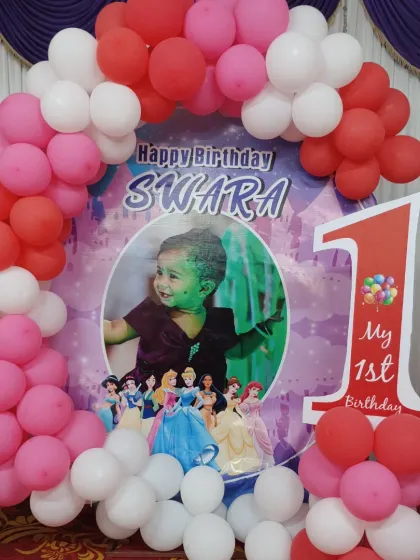 The complete photo backdrop for the Princess theme first birthday.