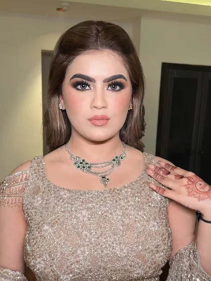 This 21-year-old makeup enthusiast wanted full glam for her event. I created a look with glowing skin and dramatic eyes that was youthful yet sophisticated.