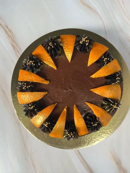 Our Drunken Zesty Belgian Chocolate cake is a crowd favorite. The rich, dark chocolate is perfectly balanced with the bright flavor of fresh oranges and a hint of liqueur, making it a sophisticated and delicious choice.