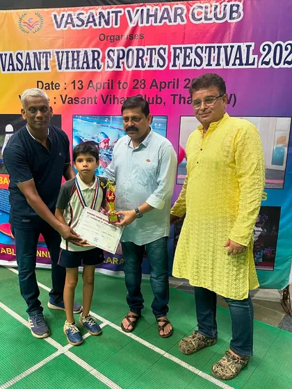 Boys U-11 runner-up Anvay Mulay receiving his award.