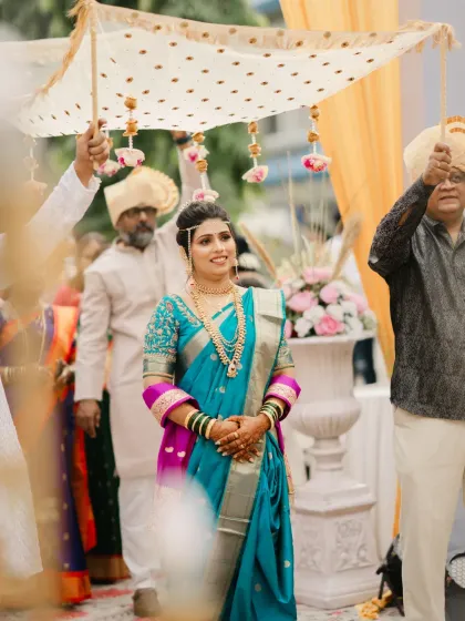 Another shot of the bride's entrance, capturing the grace and elegance of the moment.