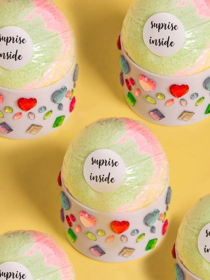 My surprise bath bombs are a treat for all senses. They fizz and release beautiful colors and fragrances in your bath, and each one has a small surprise toy inside, making them extra fun for kids.