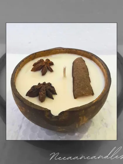 I love creating with natural elements. This is my eco-friendly candle, hand-poured into a real coconut shell and infused with the warm, spicy scents of cinnamon and star anise for a truly rustic feel.