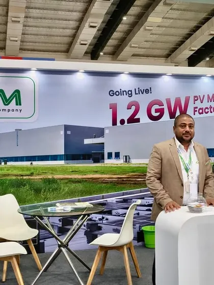 My regional manager for South India and a colleague at our professionally designed booth. We present our 1.2 GW PV Module Factory and our latest products to industry professionals.