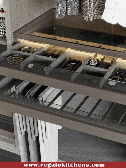 A close-up of our glass-sided accessory drawers. The transparency allows you to see the contents at a glance, while integrated lighting adds a touch of functional elegance.