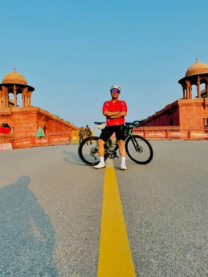 A great pose with the bike on the empty morning roads of Vijay Chowk.
