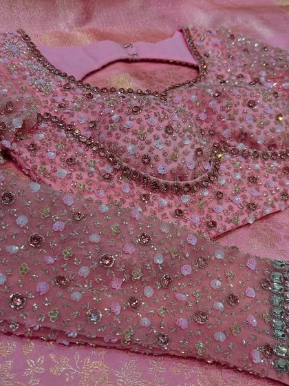 This collection showcases a variety of my custom blouse designs, from pastel engagement pieces to rich Kanjivaram pairings. Each one is uniquely crafted with different handwork techniques, fabrics, and cuts to match my client's vision.