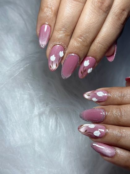 The cat eye effect on the base adds a subtle shimmer that makes the white flowers pop.