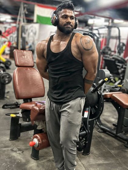 Gain, not bulk. A tricep pose showing the quality muscle I've added.