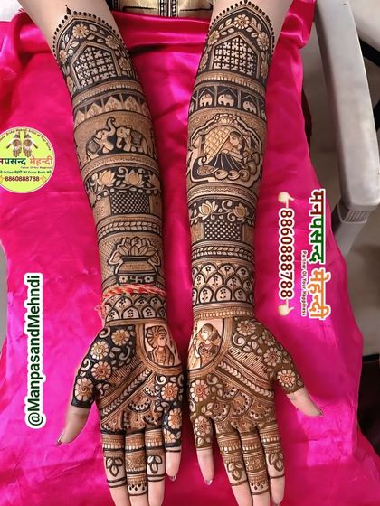 This bridal design features a bride in a doli on one arm and elephants on the other. The detailed bands of patterns create a rich, narrative-driven piece of art.