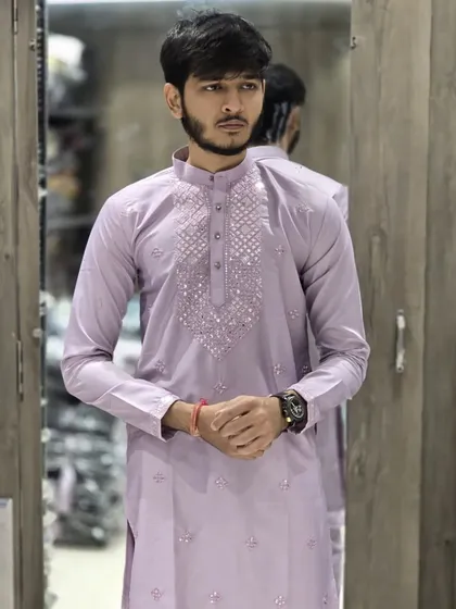 The lilac or light purple ready-to-wear kurta, a trendy and modern color choice.