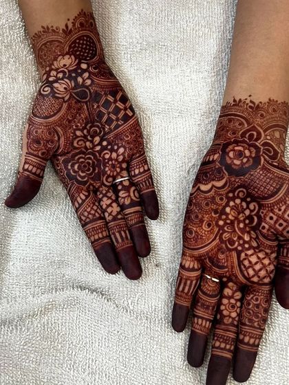 This is the rich, dark color you can expect from my cones. The design combines floral elements with checkerboard patterns, and the stain is consistent across the entire hand.