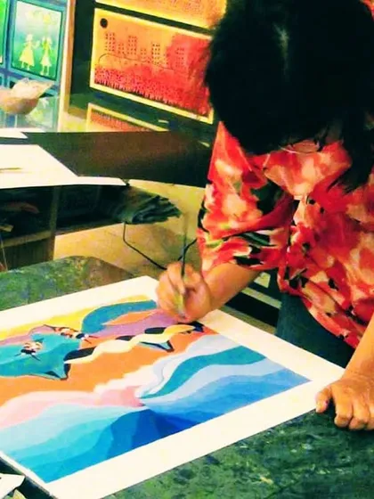 An adult student explores a vibrant, abstract landscape. My classes are a great way to relax, recharge, and learn new artistic skills.