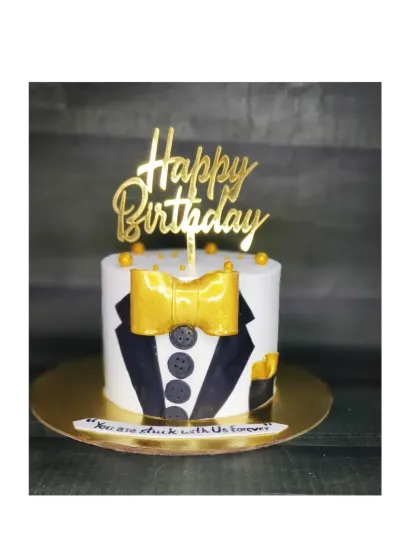 Another take on the tuxedo cake, this time with a chocolate hazelnut flavor. The golden bow tie adds a touch of class to this birthday cake.