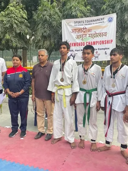Our medalists on the podium at the DDA Hari Nagar Sports Complex Taekwondo Championship.