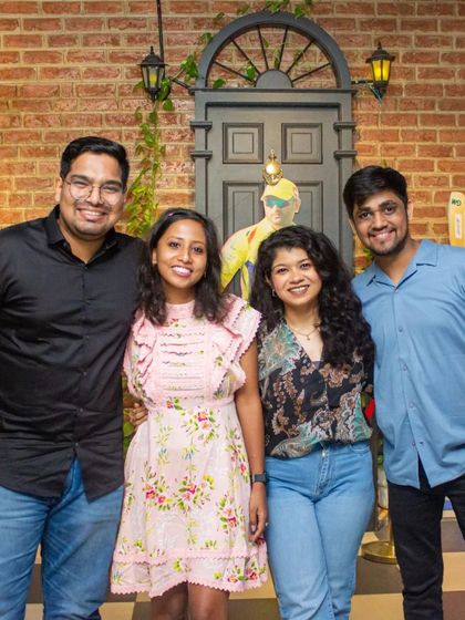A group of friends enjoying a get-together. My space is perfect for small groups to hang out, with a mix of indoor and outdoor seating to suit your preference.