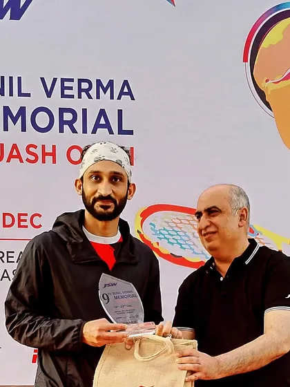 Our Masters Over 35 champion with his gold trophy. We coach winners across all age categories.