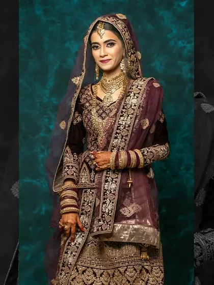 A close-up of a beautiful Muslim bridal look. The focus is on soft, romantic makeup with a deep-coloured outfit and elegant jewellery.