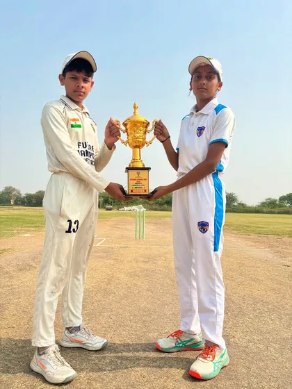 The two opposing captains, both from our academy, holding the trophy before the final.
